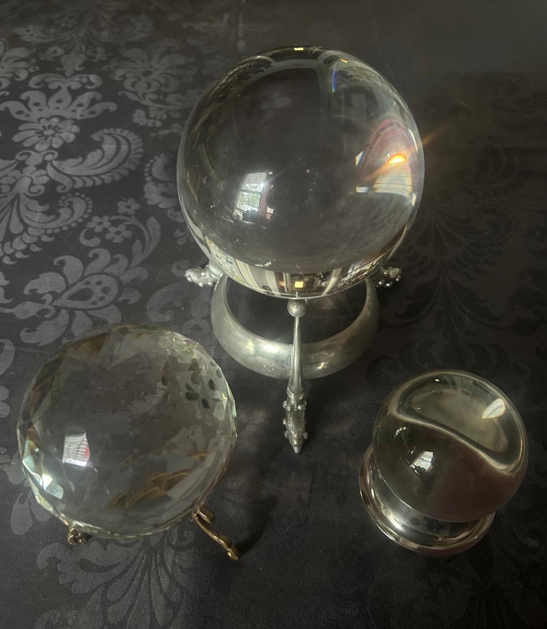 Three clear crystal balls