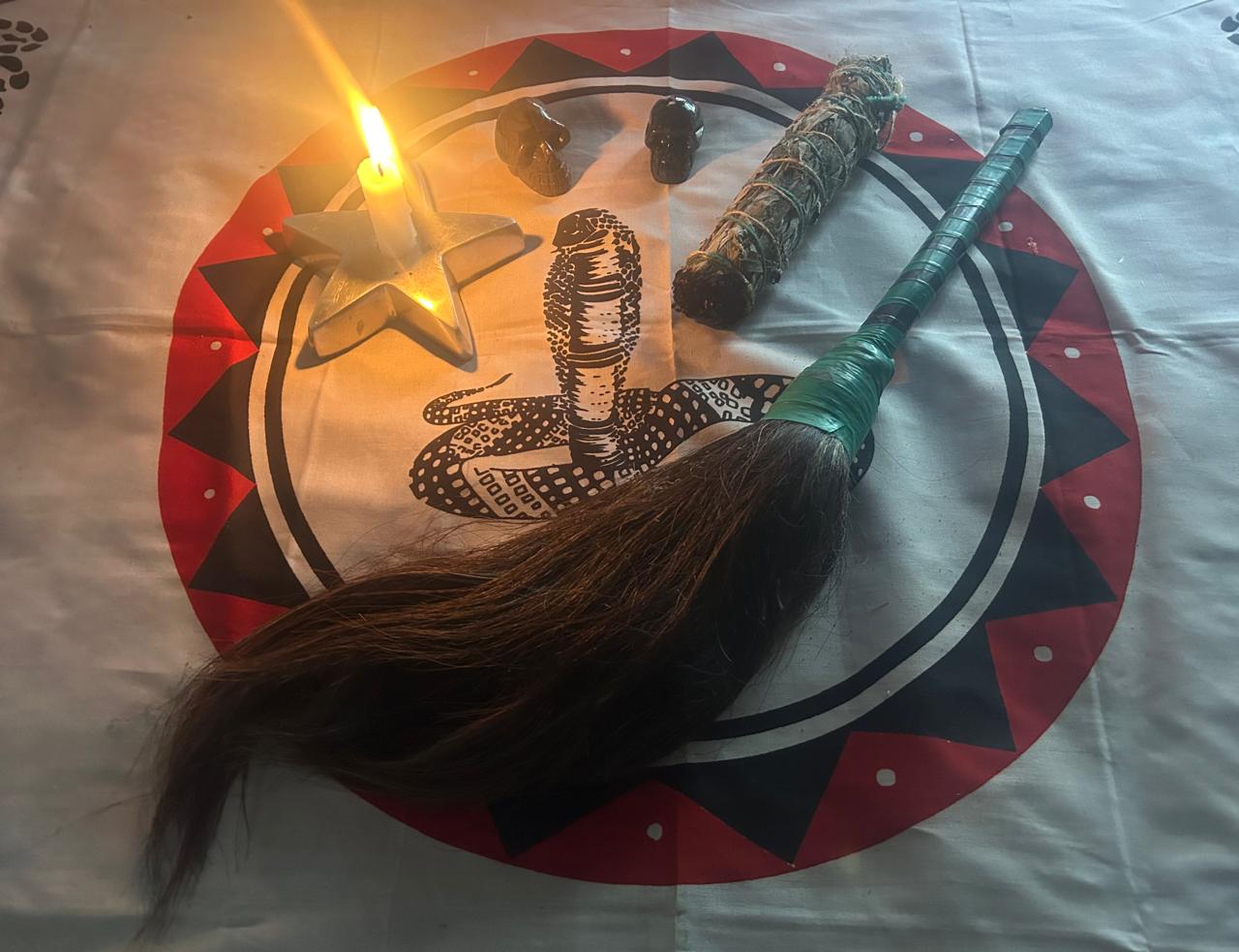 Lit Candle, Horsehair Duster on Cobra Blanket