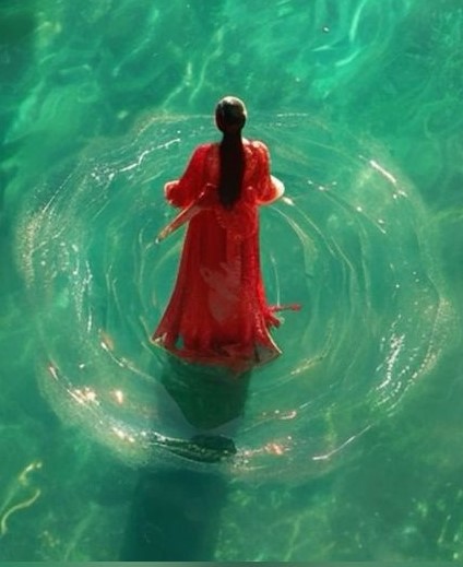 Red Woman in Water Pool
